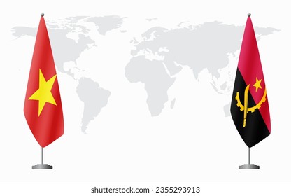 Vietnam and Angola flags for official meeting against background of world map.