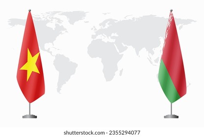 Vietnam and Belarusian flags for official meeting against background of world map.