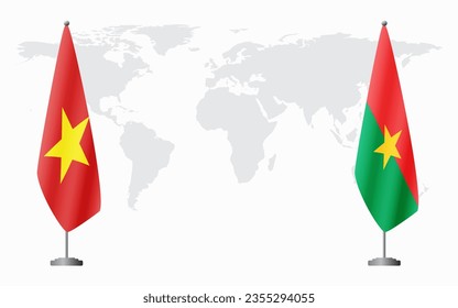 Vietnam and Burkina Faso flags for official meeting against background of world map.