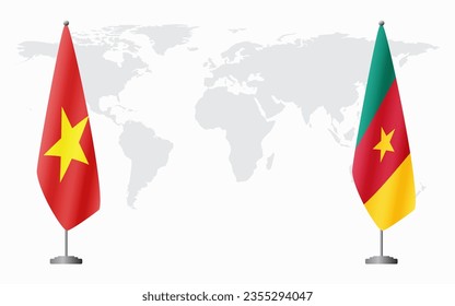 Vietnam and Cameroon flags for official meeting against background of world map.