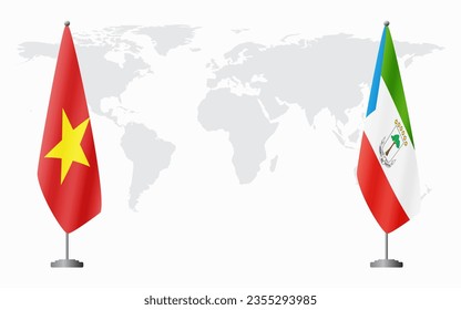 Vietnam and Equatorial Guinea flags for official meeting against background of world map.