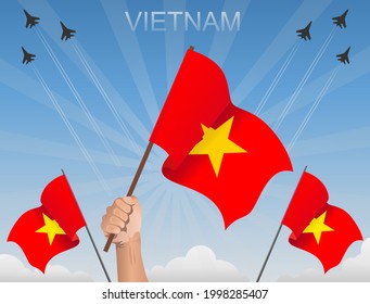 Vietnam flags fluttering under the blue sky