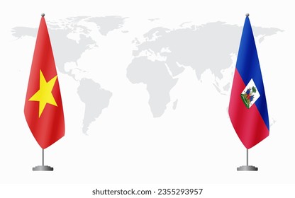 Vietnam and Haiti flags for official meeting against background of world map.