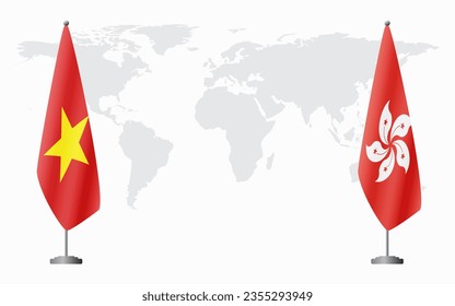 Vietnam and Hong Kong flags for official meeting against background of world map.