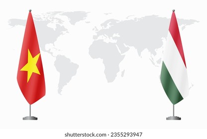 Vietnam and Hungary flags for official meeting against background of world map.