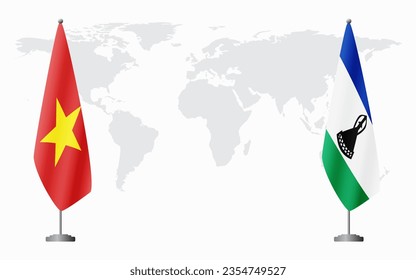 Vietnam and Lesotho flags for official meeting against background of world map.