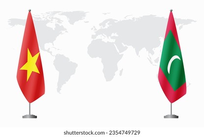 Vietnam and Maldives flags for official meeting against background of world map.