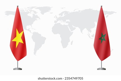 Vietnam and Morocco flags for official meeting against background of world map.