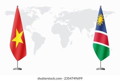 Vietnam and Namibia flags for official meeting against background of world map.