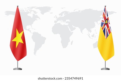 Vietnam and Niue flags for official meeting against background of world map.