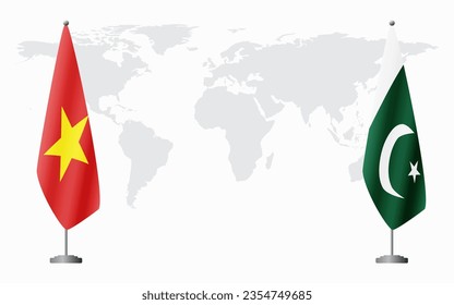 Vietnam and Pakistan flags for official meeting against background of world map.