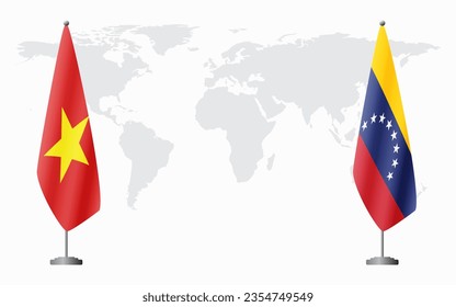 Vietnam and Venezuela flags for official meeting against background of world map.