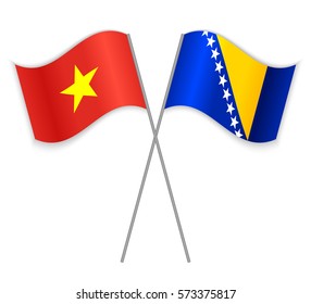 Vietnamese and Bosnian crossed flags. Vietnam combined with Bosnia and Herzegovina isolated on white. Language learning, international business or travel concept.