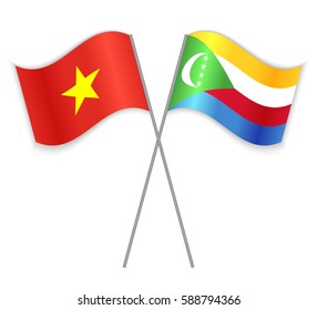 Vietnamese and Comoran crossed flags. Vietnam combined with Comoros isolated on white. Language learning, international business or travel concept.