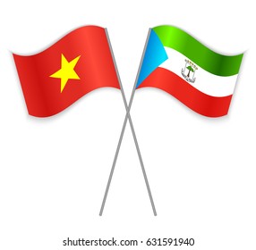 Vietnamese and Equatorial Guinean crossed flags. Vietnam combined with Equatorial Guinea isolated on white. Language learning, international business or travel concept.