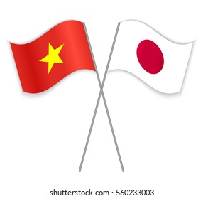 Vietnamese and Japanese crossed flags. Vietnam combined with Japan isolated on white. Language learning, international business or travel concept.