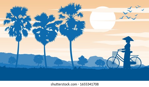 Vietnamese woman hold bicycle walk pass rice field and palm tree on sunset time,vector illustration