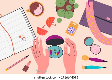 View from above. Women's holds box from under the hearing aid. Note, cosmetics, bag, battery pack, rings and earrings, plant, cup of tea. Colorful vector illustration in flat cartoon style.