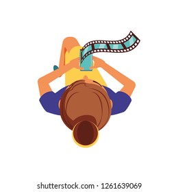 view aerial of woman with smartphone and tape video