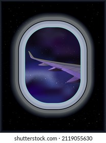 View of an airplane wing from a porthole window at night