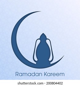 view of a arabic lamp resting on a moon for the celebration of ramadan kareem and eid mubarak and other muslim festivals.