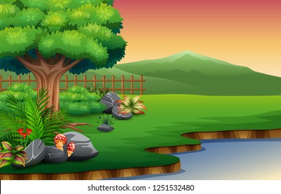 View of the beautiful park by the river with a mountain