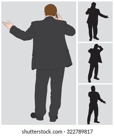 View from behind of businessman having a conversation on his cell phone