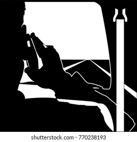View from behind of a man speaking on the mobile phone in the passenger side of a car and wearing no seat belt