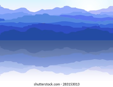 View of blue mountains reflected in the water.Mountain  landscape.