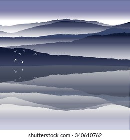 View of blue mountains reflected in the water.Mountain  landscape.