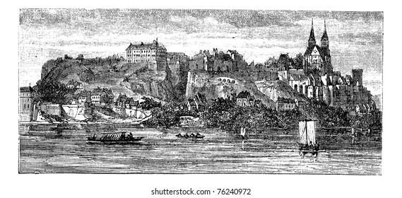 View of boats in river with building and castle on a hill in the background, in Old Breisach, Germany, vintage engraving from 1890s.