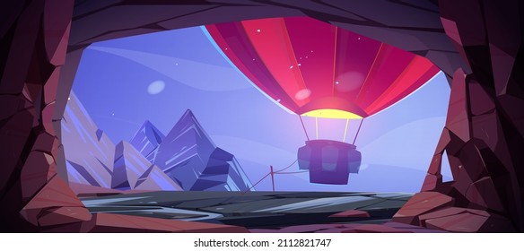 View from cave in rock to hot air balloon tied outside. Vector cartoon illustration of winter mountain landscape with stone cavern entrance, snow and airship with basket