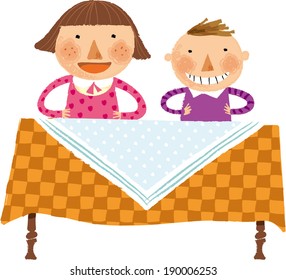 The view of children are sitting together at the table 