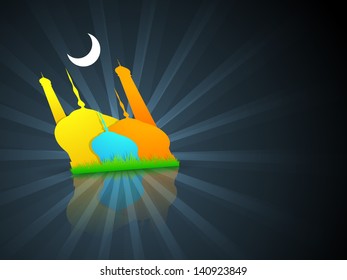 View of colorful Mosque in moonlight on blue background for Ramadan Kareem.