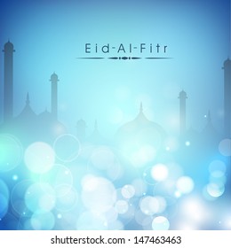 View of mosque on shiny blue background for Muslim community festival Eid Al Fitr (EId Mubarak).