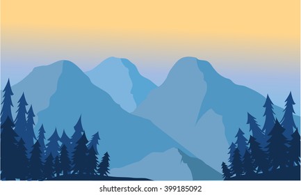 View of the mountain ice and spruce at sunrise