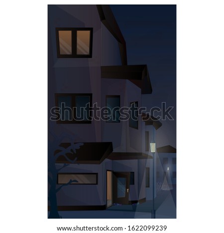 view of the night city. House. light in the window.