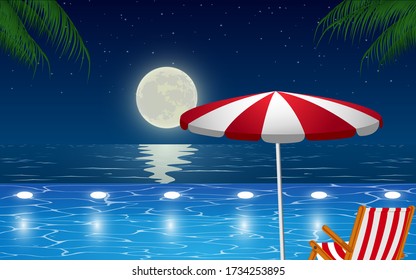 view of outdoor swimming pool on the beach in night
