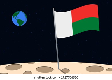 View of planet Earth from the surface of the Moon with the Madagascar flag and holes on the ground