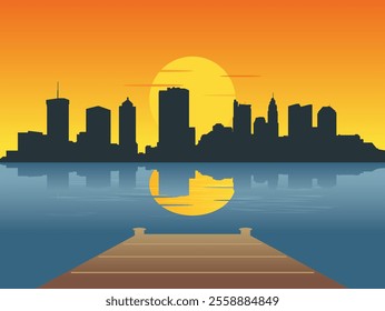 View from the river dock at sunrise - sunset over the city of Columbus  skyline with the reflection of the city and the sun in the water