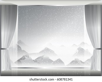 view of snowstorm and mist on mountain in room with large window