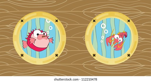 View from the two boat windows showing lobster and fishes