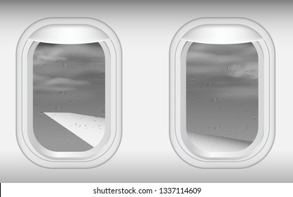 view of windows of plane in on the sky in the rain 