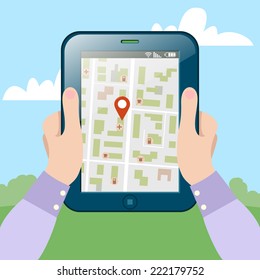 Viewing a map on your digital tablet.  Vector