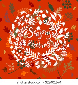 Vignette of colourful leaves, ncludes text Seasons greetings Vector illustration
