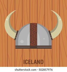 viking iceland helmet .flat vector illustration of viking helmet on wood texture backgroud with Iceland lettering