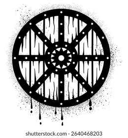 Viking shield with black spray paint graffiti