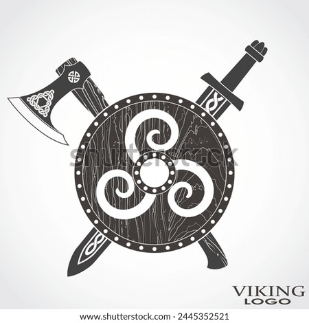 viking shield with sword and axe heraldry symbol