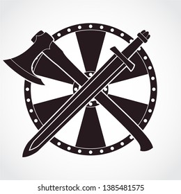 vikIng sword and axe on shield heraldry symbol