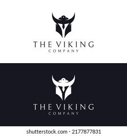 Viking warrior helmet logo with horned helmet and vikings with letter V.